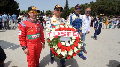 Drivers and Officials Visit Martyrs' Memorial
