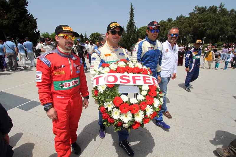 Drivers and Officials Visit Martyrs' Memorial
