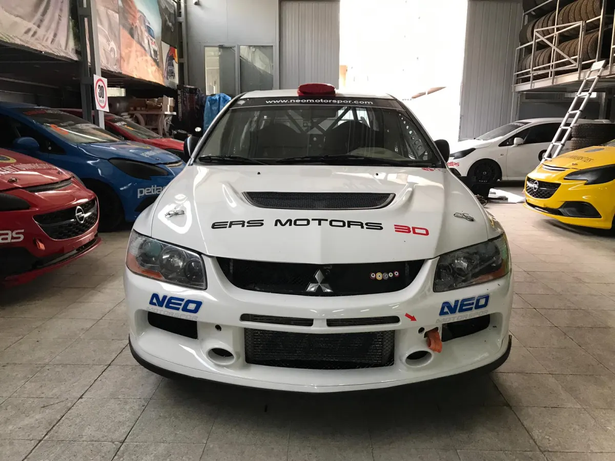 Champion Behind the Wheel of an EVO IX